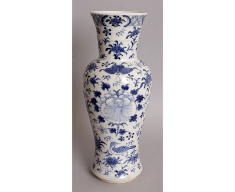 A 19TH CENTURY CHINESE BLUE & WHITE PORCELAIN VASE, painted with a bird, bats and butterflies amidst sprays of fruit and foli