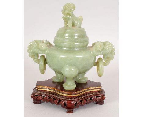 A 20TH CENTURY CHINESE GREEN BOWENITE TRIPOD CENSER & COVER, together with a fitted carved wood stand, the censer with loose 