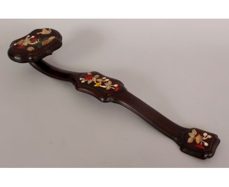 AN EARLY 20TH CENTURY CHINESE ONLAID HARDWOOD RUYI SCEPTRE, decorated with floral designs in onlaid hardstones, mother-of-pea