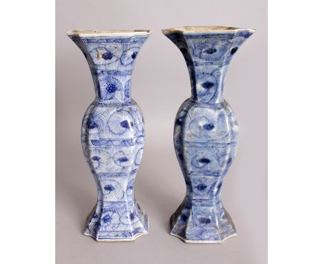 A PAIR OF CHINESE KANGXI PERIOD BLUE & WHITE PORCELAIN VASES, each of indented rectangular section, the sides painted with an