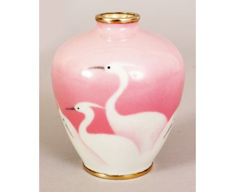 A JAPANESE MEIJI PERIOD PINK GROUND MUSEN WIRELESS CLOISONNE ENAMEL VASE, decorated with egrets reserved in white enamel, the