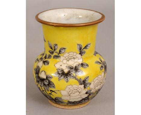 A CHINESE YELLOW GROUND EMPRESS DOWAGER STYLE PORCELAIN VASE, decorated in grey and white enamels with extended flowers and l