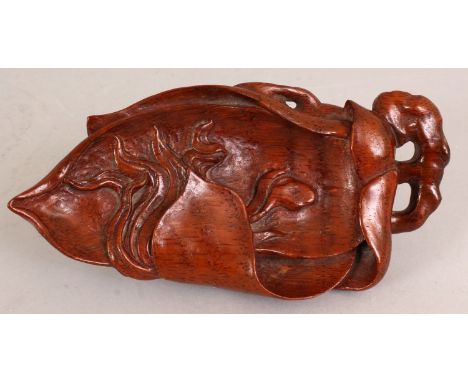 A CHINESE BAMBOO MODEL OF AN OPEN LOTUS LEAF, 7in long x 3.5in wide.
