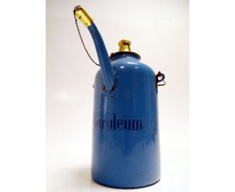 A 3-litre priming kettle in early blue stove enamel with decorative 'Petroleum' script, complete with wooden carrying handle,