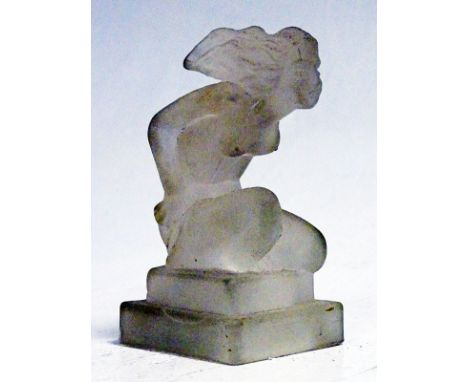 Features hollow base area for illumination by a lightbulb. Some light damage and wear to the square base, reputedly caused by