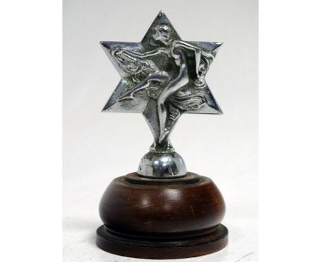 An attractive motorcar mascot, in the shape of a star, as fitted to the Midlands-manufactured Star light cars of the Edwardia