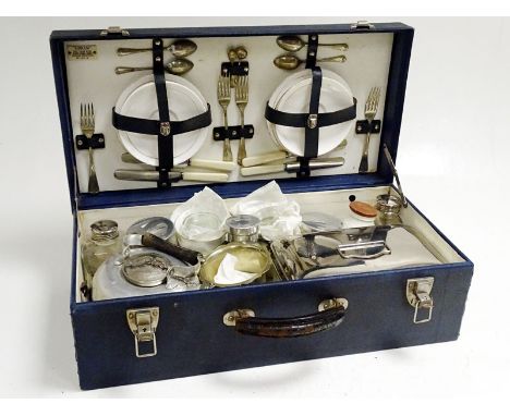 Contains Sirram and Worcester bone china interior fittings, food box, cutlery, tumblers etc. Good condition.