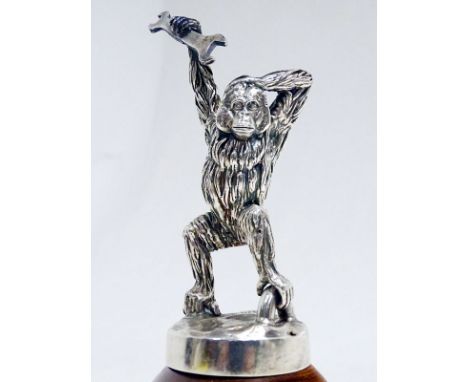 Monkey Mechanic` accessory mascot by Charles Paillet. Features a well-detailed primate holding an oversized spanner in the ai
