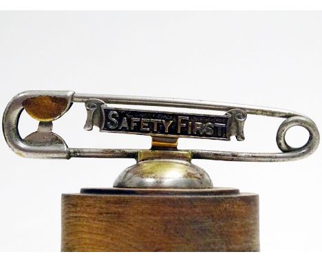 One of the most sought after of all British factory mascots, this piece comprises a fully functioning oversize safety pin, fe