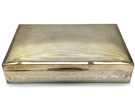 Silver rectangular cigarette box with engine turned decoration and presentation inscription 1971 W16cm 