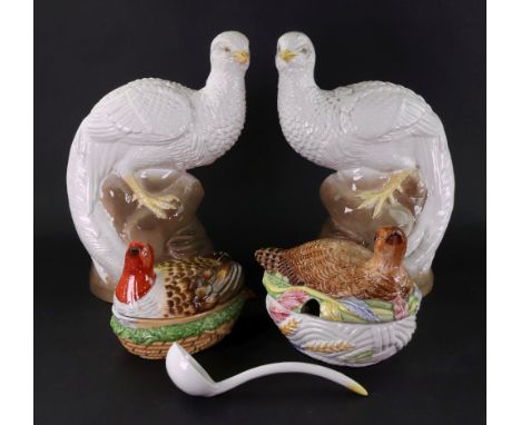 A pair of Studio pottery figures of peacocks, 20th century, perched on rock work, 27cm high, a novelty tureen and ladle, in t