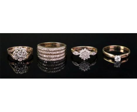 A collection of four 9ct gold, diamond-set dress rings comprising: a single stone diamond ring, approximate diamond weight 0.