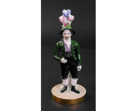 A Chamberlains Worcester figure representing one of the Rainer brothers, famous Tyrolean singers, his elaborate hat with a pl