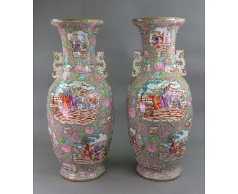 An unusual and large pair of Staffordshire earthenware two handled baluster vases, in 18th century Chinese export style, circ