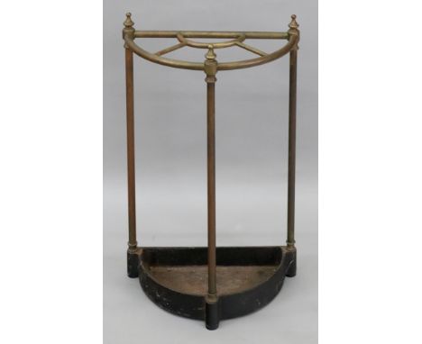 A Victorian style tubular brass column demi-lune stick stand, with five divisions and cast iron drip tray base, 38cm wide x 2