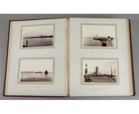 Photographs; a late 19th century photograph album, 1894-1902 with views including Bristol, Newcastle, 'Old Lifeboat', Japanes