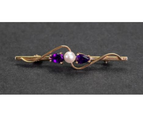 A 9ct gold, amethyst and cultured pearl bar brooch, the central cultured pearl, between two claw-set pear-cut amethysts, to a