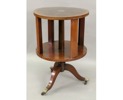 An Edwardian mahogany satinwood crossbanded boxwood and ebony strung revolving drum bookcase, in Regency style, the top centr