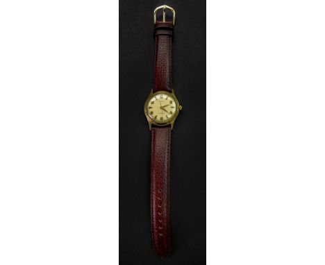 Hermes; a gold plated and stainless steel Shockproof wristwatch, the dial with Arabic numerals and gilt markers, with a 17 je