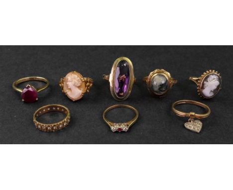 A collection of eight 9ct gold and gem-set rings, comprising: a shell cameo ring; an agate cameo ring; a ruby dress ring; an 