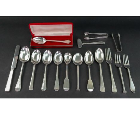 A Victorian foliate engraved silver christening spoon, Lias & Wakely, London 1880, monogrammed, a smaller similar, London 189