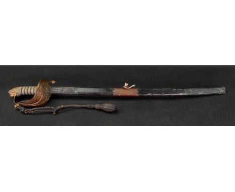 A naval officers sword, with wirebound fishskin grip, lion head pommel and bullion knot, the blade incomplete, in black leath