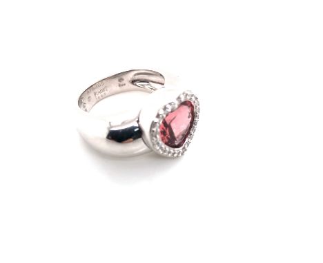 A PIAGET RING. AN 18ct WHITE GOLD PIAGET PINK TOURMALINE AND DIAMOND HEART SHAPE RING. DATED 1997, REF NUMBER A76965. FINGER 