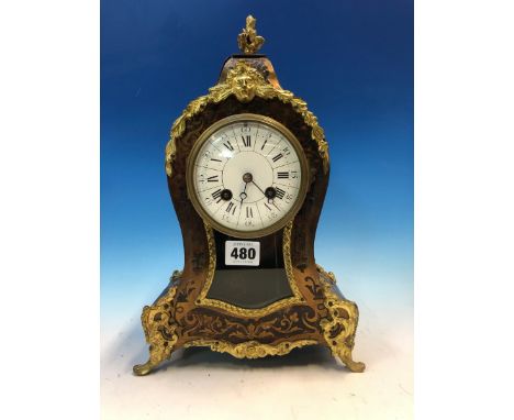 A LATE 19th C.BOULLE CASED CLOCK STRIKING ON A COILED ROD, THE CIRCULAR ENAMEL DIAL BELOW A SWAGGED MASK AND AN URN FINIAL.  