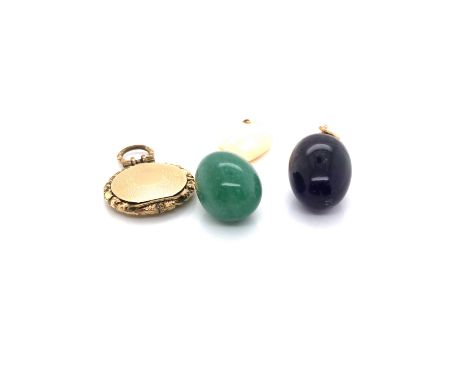 AN AMETHYST AND A GREEN AVENTURINE EGG FORM PENDANT WITH 9ct GOLD FITTINGS TOGETHER WITH AN BONE HEART PENDANT WITH GOLD FITT