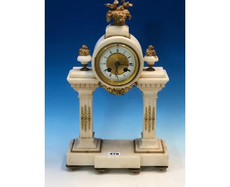 A FRENCH ORMOLU MOUNTED WHITE MARBLE PORTICO CLOCK, THE MARTI MOVEMENT STRIKING ON A BELL, THE ENAMEL CHAPTER RING BELOW TWO 