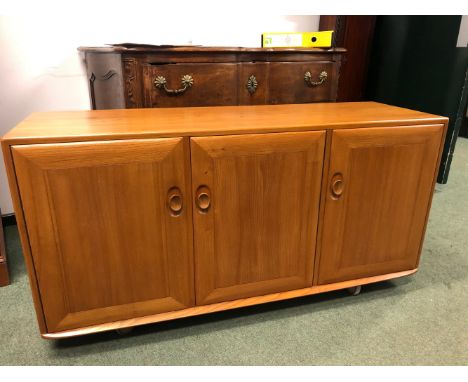 AN ERCOL SIDEBOARD