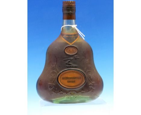 A BOTTLE OF VINTAGE HENNESSY COGNAC 