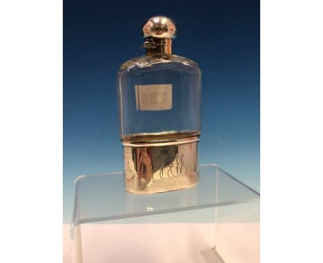 A HALLMARKED SILVER MOUNTED CUT GLASS POCKET FLASK. LONDON 1905/6