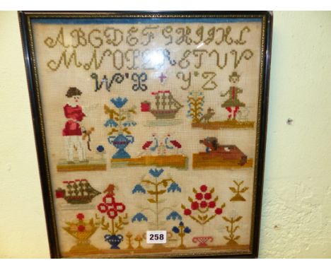 A WOOL SAMPLER WORKED WITH THE ALPHABET ABOVE FIGURES, BIRDS, FLOWERS, A DOG AND SCHOONERS, THE FRAME.   38 x 33cms.