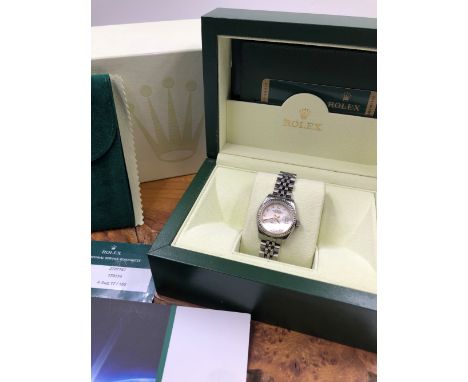 A ROLEX OYSTER LADY DATEJUST STAINLESS STEEL WATCH ON JUBILEE WATCH BRACELET. MODEL NUMBER 179174. COMPLETE WITH INNER AND OU
