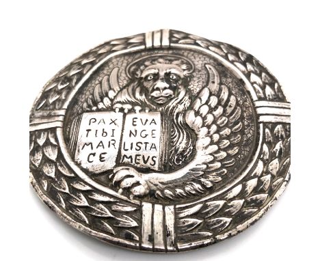 A VINTAGE WHITE METAL BELT BUCKLE DEPICTING THE LION  OF ST MARK THE EVANGELIST AND LATIN MOTTO "PAX TIBI MARCE EVANGELISTA M