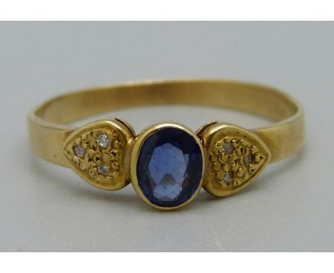 A 14ct gold, sapphire and six diamond ring, 1.7g, N 