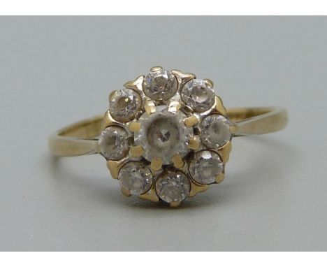 A 9ct gold and white stone cluster ring, 2g, O 