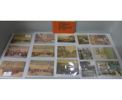 Twenty-one vintage French military postcards and a Mont St. Michel postcard booklet 