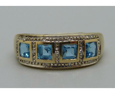 A 9ct gold, topaz and diamond ring, 3g, U 