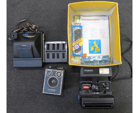 Two Polaroid cameras and a box camera 