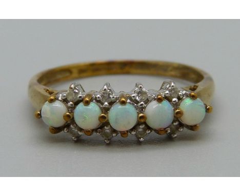 A 9ct gold, opal and white stone ring, 2g, P 