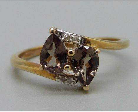 A 10k gold, diamond and gemstone ring, 2.1g, L 