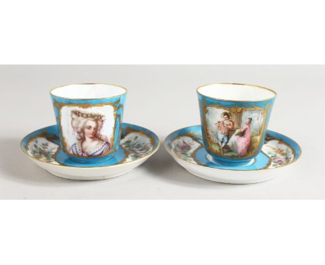 A PAIR OF SEVRES PORCELAIN CUPS AND SAUCERS with portraits and vignettes of flowers over a blue ground. Saucers 4.75ins diame
