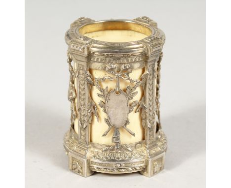 A SMALL FRENCH SILVER AND IVORY VASE with pierced decoration. 2.25ins high.