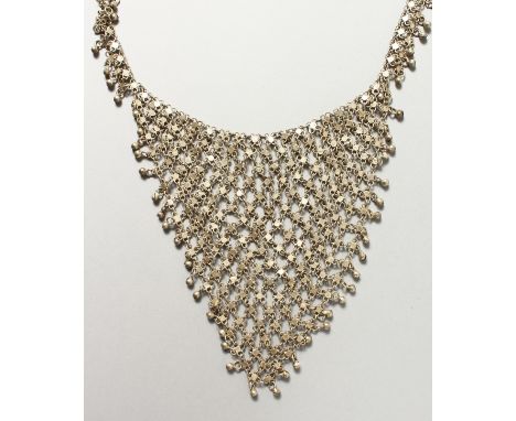 AN ISLAMIC SILVER METAL CHAIN.