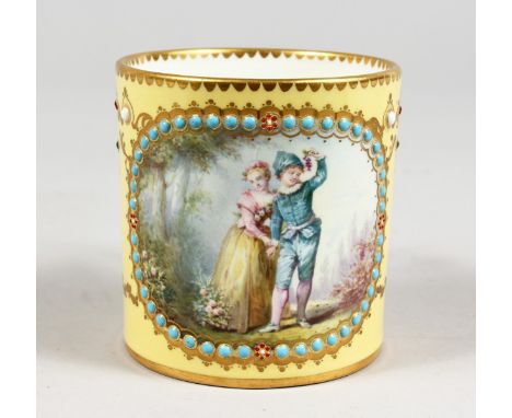 A GOOD SEVRES YELLOW GROUND CAN painted with panel of a boy and girl with turquoise bead decoration. Sevres mark in blue, let