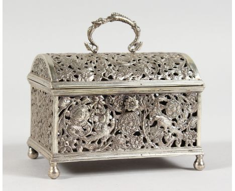 A GOOD DUTCH SILVER DOMED TOP MARRIAGE CASKET, with pierced panels, flowers and birds with swan swing handle, supported on fo