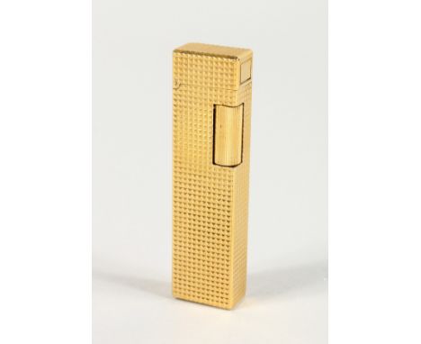 A COLIBIRI GILT METAL CIGARETTE LIGHTER.