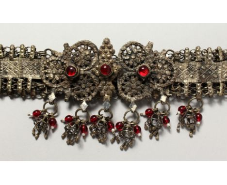 A GOOD ISLAMIC SILVER METAL BELT.